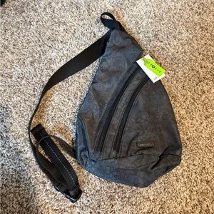 NWT Sakroots Black Floral Sling Backpack